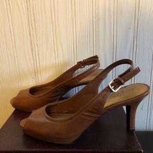 Like new, Women’s brown peep toe heels.